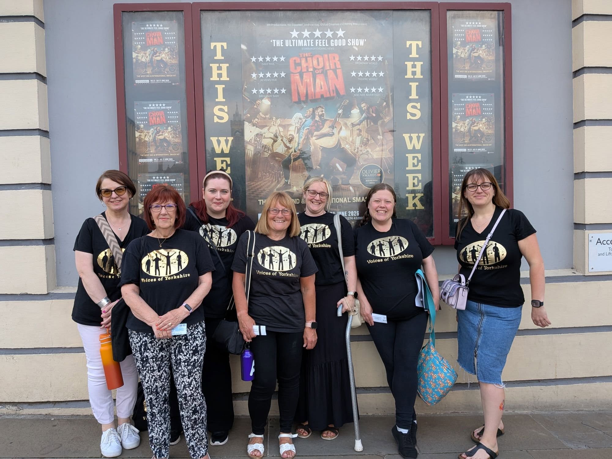 A group of VOY members outside the theatre before a show